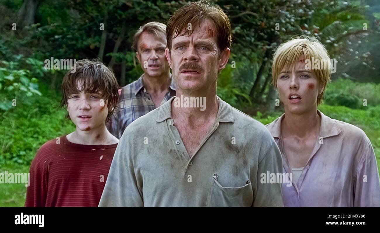 USA. Sam Neill , Trevor Morgan , William H. Macy and Tea Leoni in a scene  from (C)Universal Pictures film: Jurassic Park III (2001) Plot: A decidedly  odd couple with ulterior motives