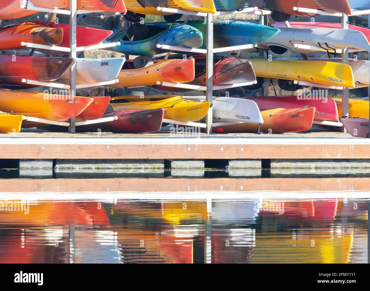 Rental Kayaks Stacked Multiple Colors Stock Photo