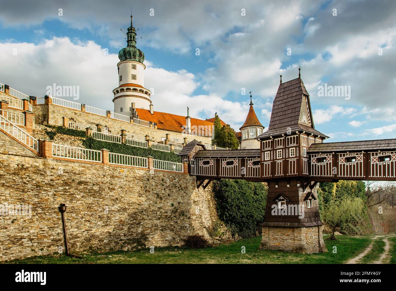 Old carved wooden Jurkovic bridge with charming castle tower in Nove Mesto nad Metuji, pearl of Eastern Bohemia, Czech Republic.Czech renaissance Stock Photo