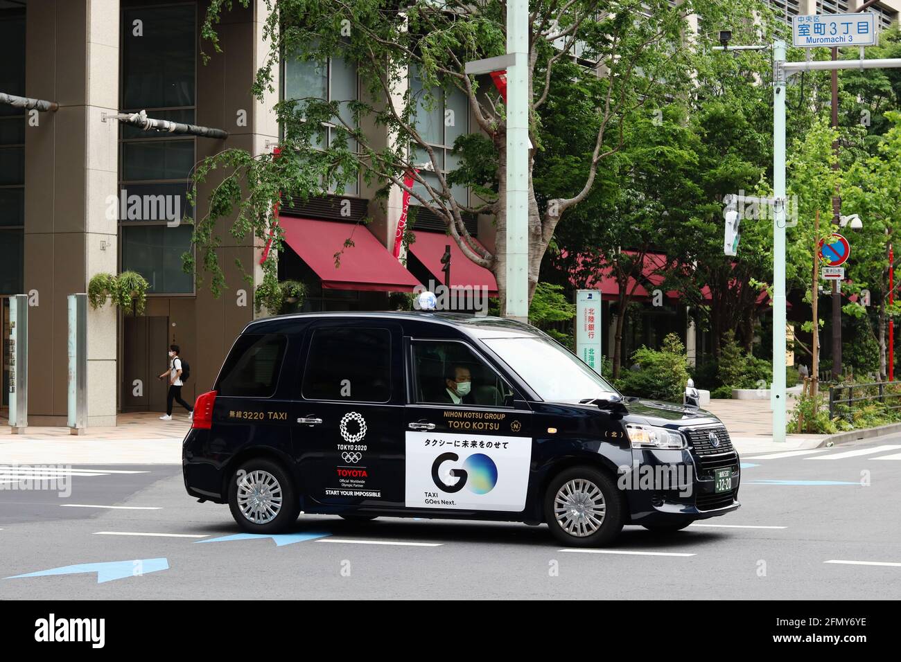TOKYO, JAPAN - May 12, 2021: Toyota Taxi sporting the Tokyo 