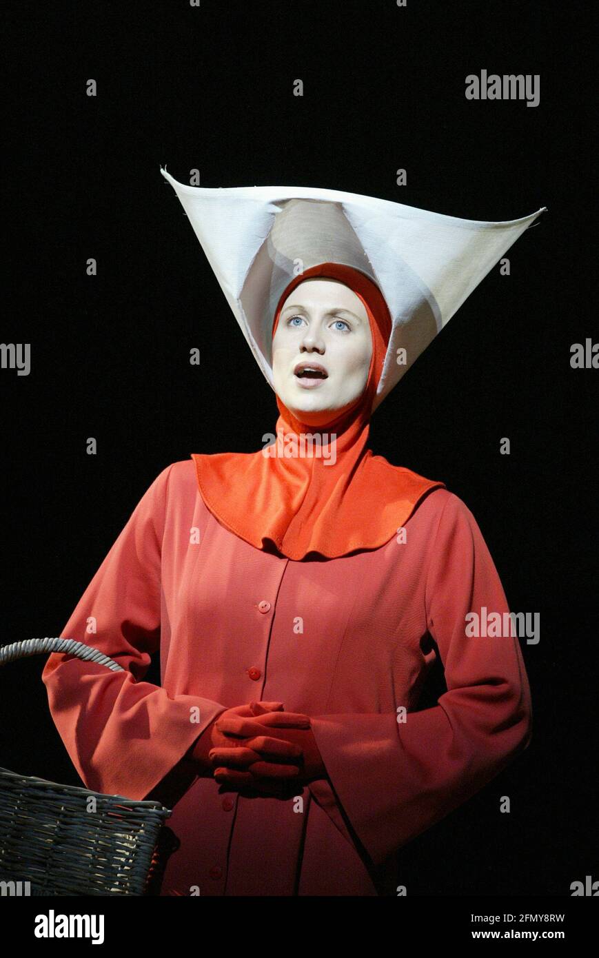 Stephanie Marshall (Offred) in THE HANDMAID'S TALE at English National Opera (ENO), London Coliseum, London WC2  03/04/2003  music: Poul Ruders  libretto: Paul Bentley after the novel by Margaret Atwood  conductor: Elgar Howarth  design: Peter McKintosh  lighting: Simon Mills  choreographer: Andrew George  director: Phyllida Lloyd Stock Photo