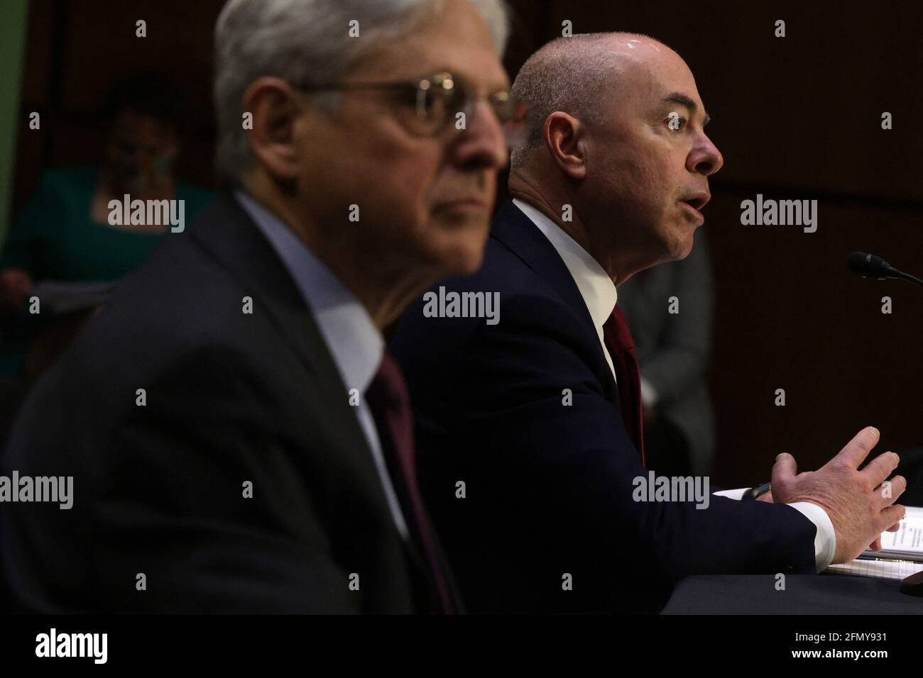 Washington, United States. 12th May, 2021. U.S. Attorney General Merrick Garland (L) and Homeland Security Secretary Alejandro Mayorkas testify during a hearing before the Senate Appropriations Committee at Hart Senate Office Building on May 12, 2021 on Capitol Hill in Washington, DC. The committee held a hearing on âÂ€ÂœDomestic Violent Extremism in America.âÂ€Â Photo by Alex Wong/Pool/ABACAPRESS.COM Credit: Abaca Press/Alamy Live News Stock Photo