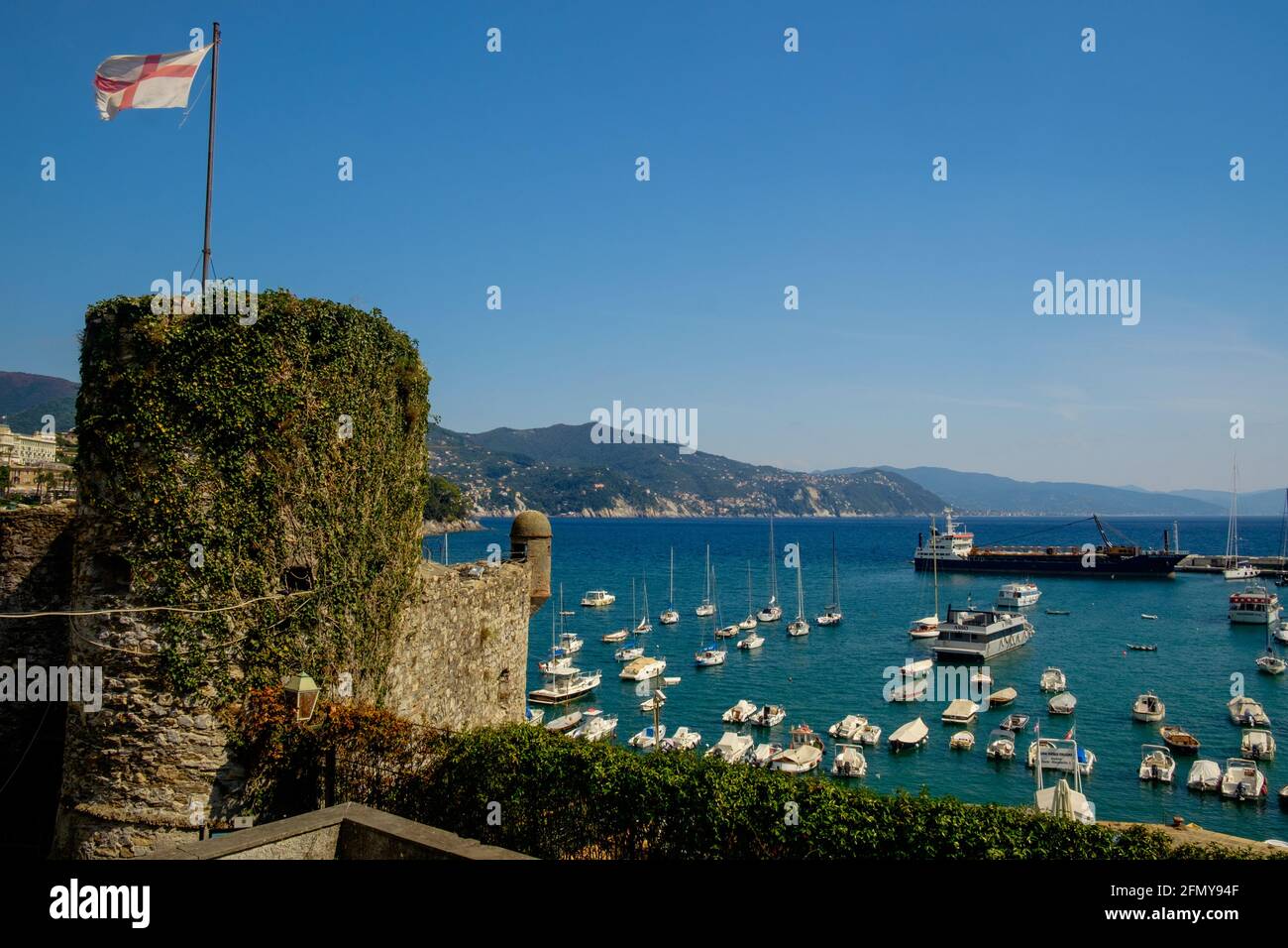 Tower of the 16th century castle of Santa Margherita Ligure with a view on the Ligurian sea. Stock Photo