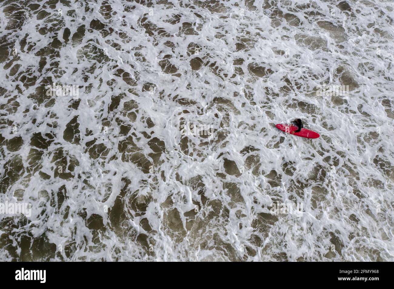 Person on surf board aerial hi-res stock photography and images - Alamy