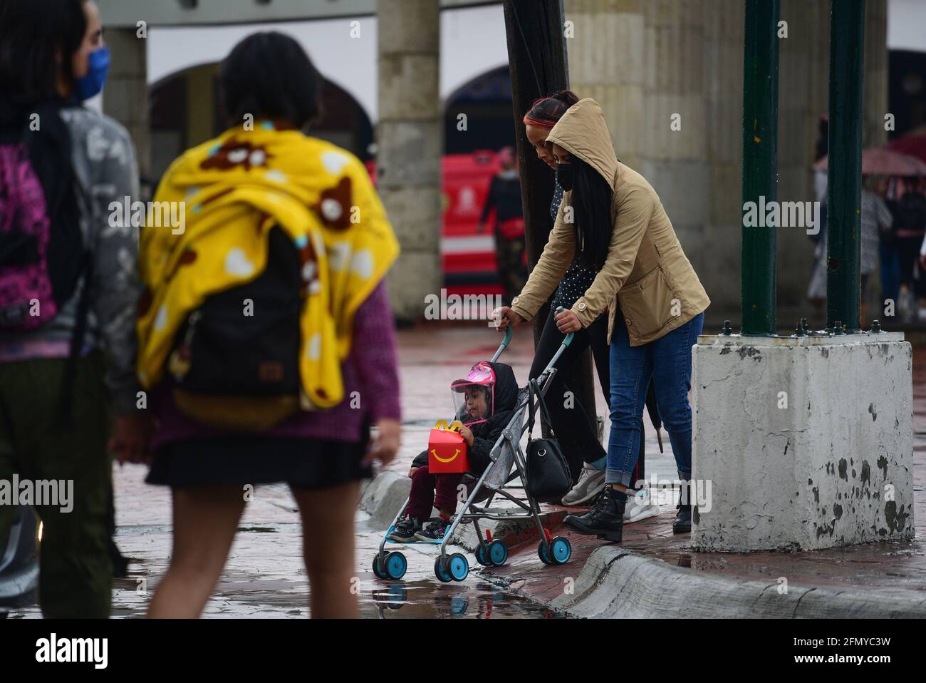 Non Exclusive: TOLUCA, MEXICO - MAY 12: A woman walk your child in a ...