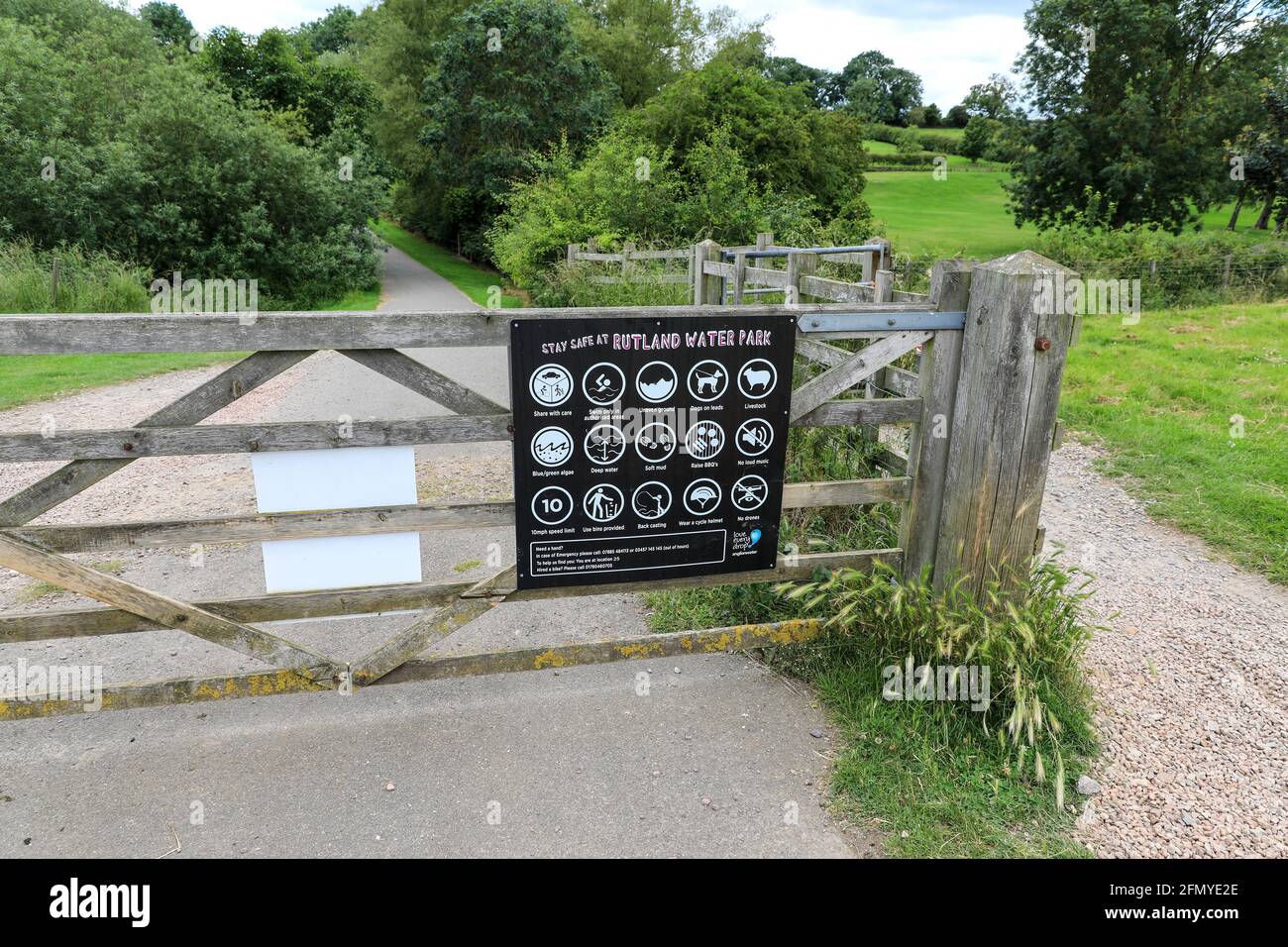 An information board or sign on a wooden gate outlining how to stay safe at Rutland Water, Rutland, England, UK Stock Photo