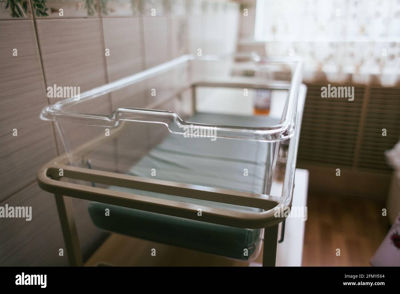 New born hospital bed. Empty bed of a newborn in the hospital. Stock Photo