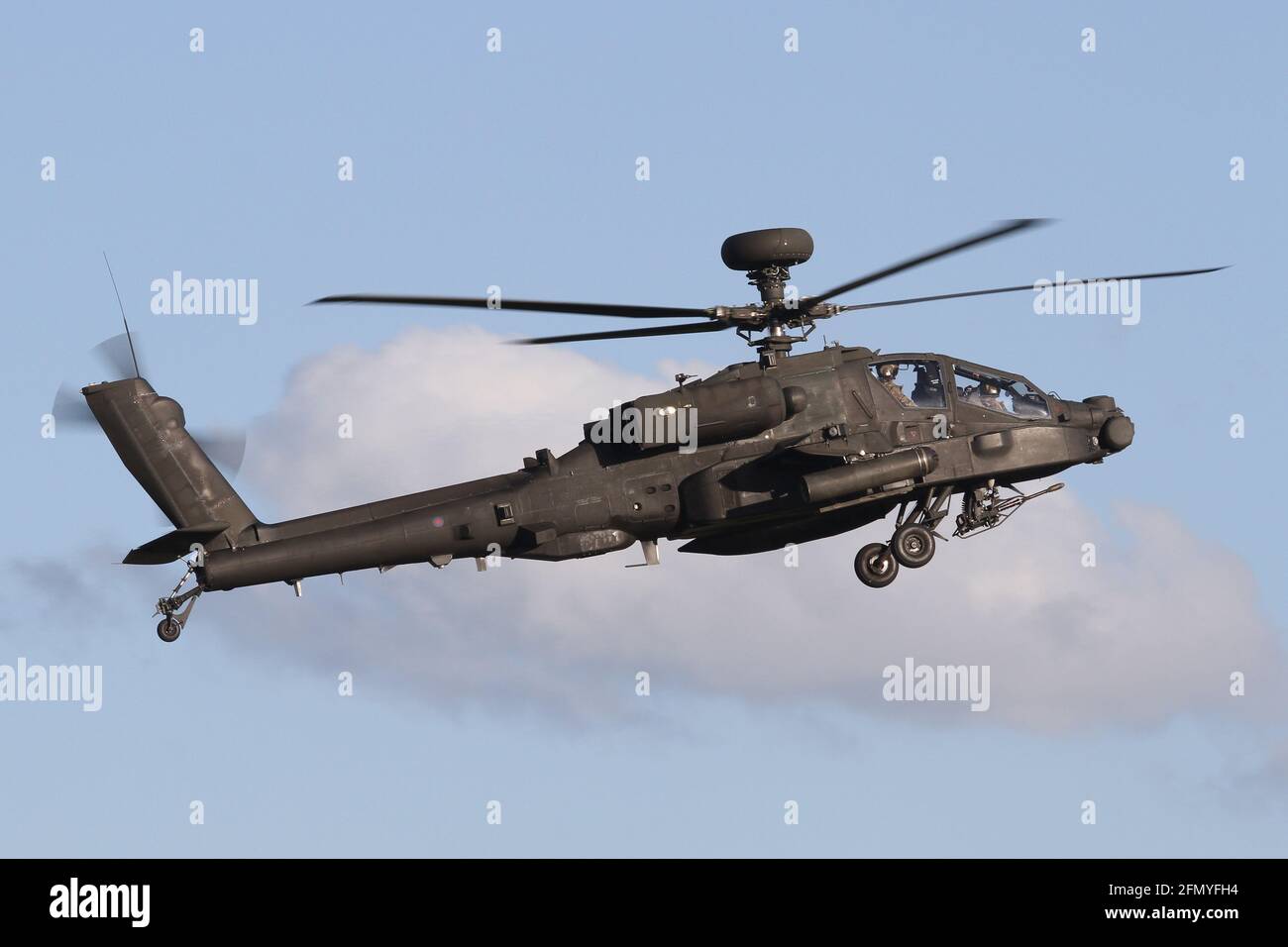 AAC Apache landing at Wattisham airfield in Suffolk. Stock Photo