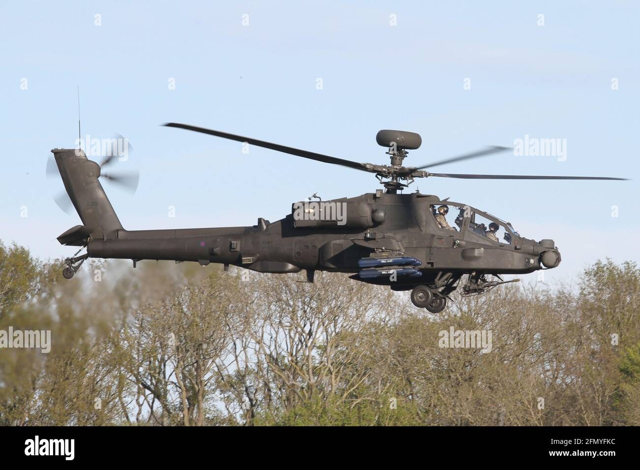 Army Air Corps Apache helicopter landing at Wattisham airfield in Suffolk. Stock Photo