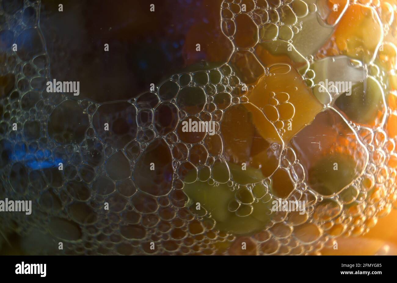 Extreme closeup macro shot of Chopped vegetables in a transparent jar