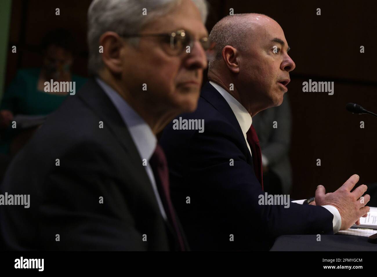 Washington, USA. 12th May, 2021. WASHINGTON, DC - MAY 12: U.S. Attorney General Merrick Garland (L) and Homeland Security Secretary Alejandro Mayorkas testify during a hearing before the Senate Appropriations Committee at Hart Senate Office Building on May 12, 2021 on Capitol Hill in Washington, DC. The committee held a hearing on “Domestic Violent Extremism in America.” (Photo by Alex Wong/Pool/Sipa USA) Credit: Sipa USA/Alamy Live News Stock Photo