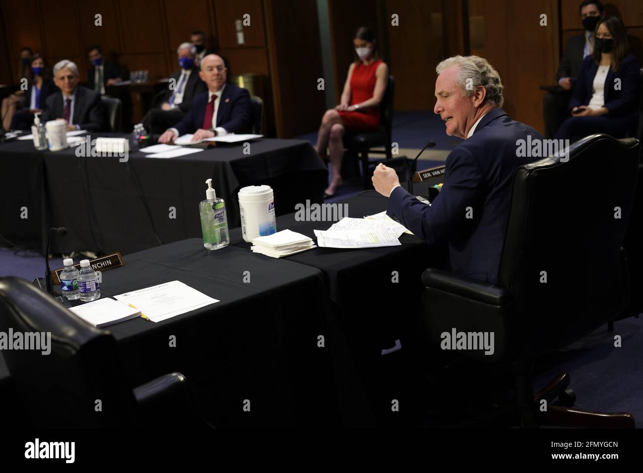 Washington, USA. 12th May, 2021. WASHINGTON, DC - MAY 12: U.S. Sen. Chris Van Hollen (D-MD) (R) speaks as Attorney General Merrick Garland (L) and Homeland Security Secretary Alejandro Mayorkas (2nd L) testify during a hearing before the Senate Appropriations Committee at Hart Senate Office Building on May 12, 2021 on Capitol Hill in Washington, DC. The committee held a hearing on “Domestic Violent Extremism in America.” (Photo by Alex Wong/Pool/Sipa USA) Credit: Sipa USA/Alamy Live News Stock Photo