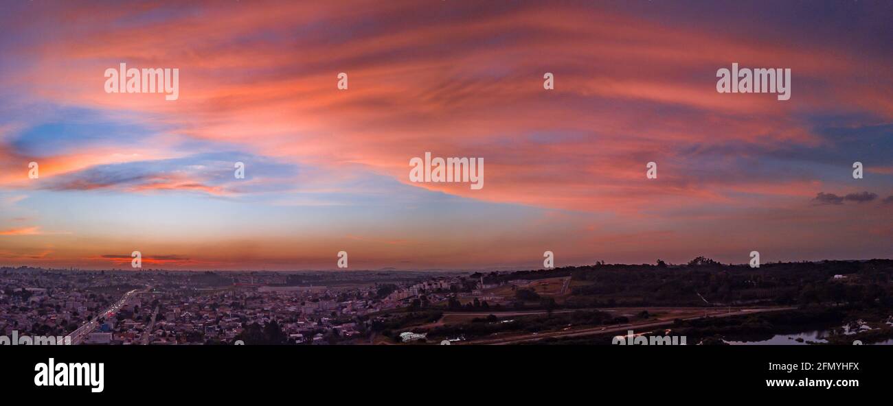 Aerial drone image of sunset with vanilla sky and clouds with pink and ...