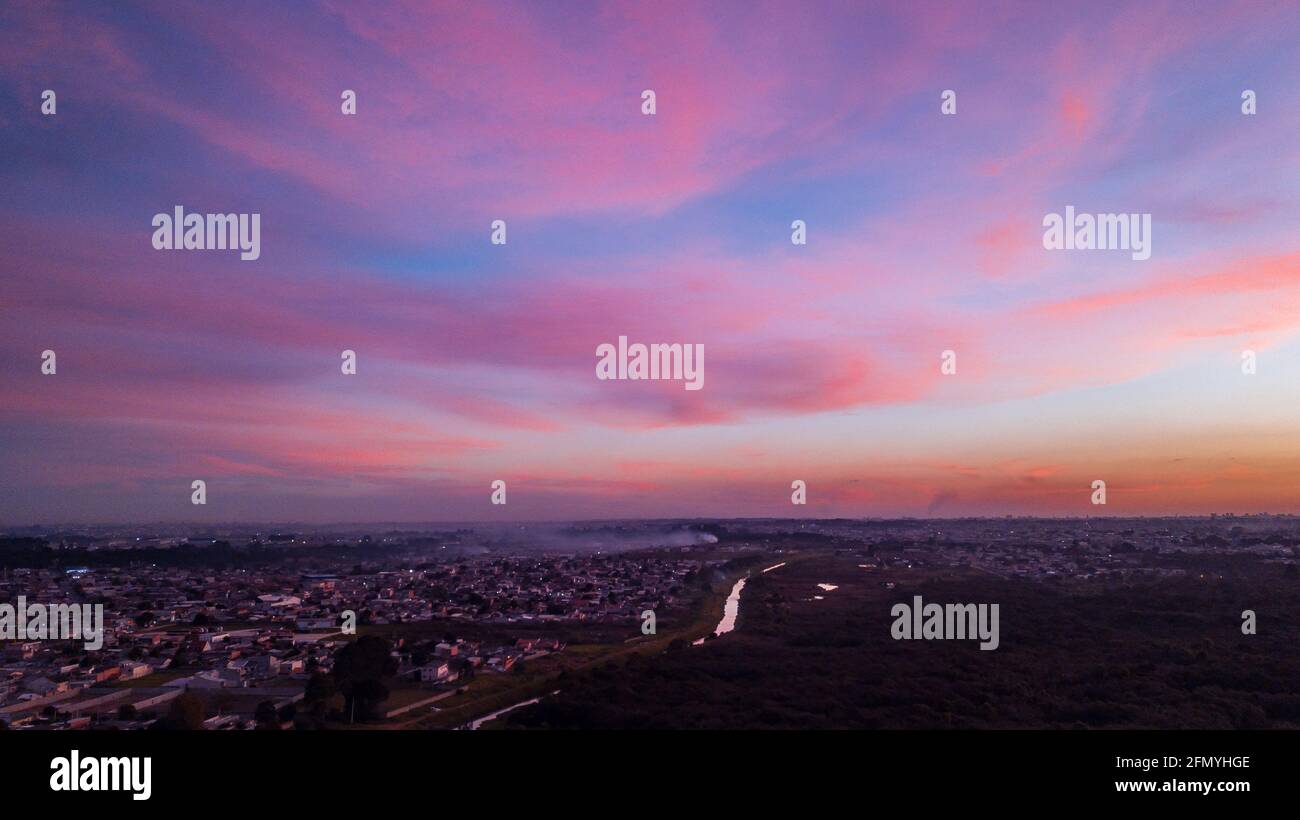 Aerial drone image of sunset with vanilla sky and clouds with pink and ...