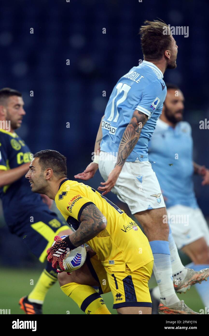 Rome, Italy. 12th May, 2021. ROME, Italy - 12.05.2021: LUIGI SEPE (PARMA), Ciro Immobile (LAZIO) in action during the Italian Serie A championship 2021 soccer match between SS LAZIO VS PARMA at Olympic stadium in Rome. Credit: Independent Photo Agency/Alamy Live News Stock Photo