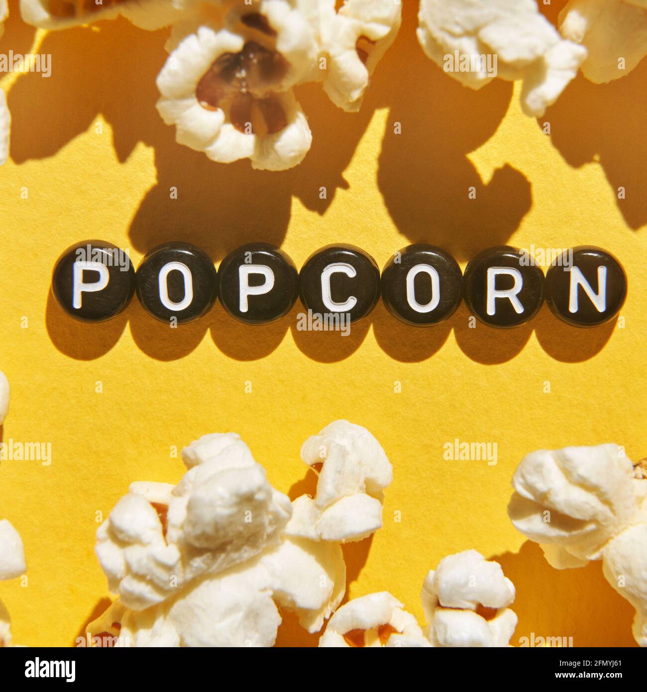 Popcorn quote design. Typography concept. Creative text wallpaper Stock