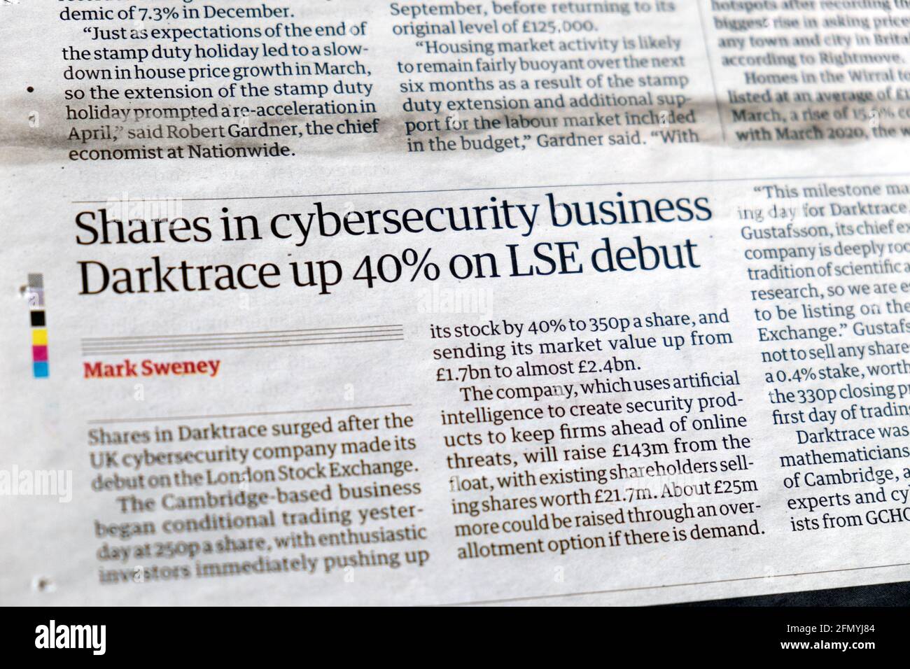 'Shares in cybersecurity business Darktrace up 40% on LSE debut' newspaper headline article in Guardian on 30 April 2021 London Great Britain UK Stock Photo