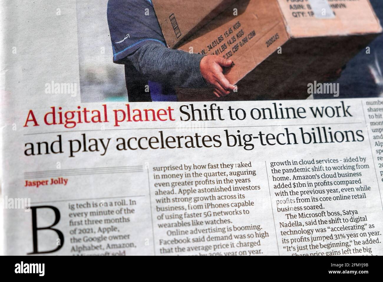 'A digital planet Shift to online work and play accelerates big-tech billions' newspaper headline article in Guardian on 1 May 2021 London Great Br Stock Photo