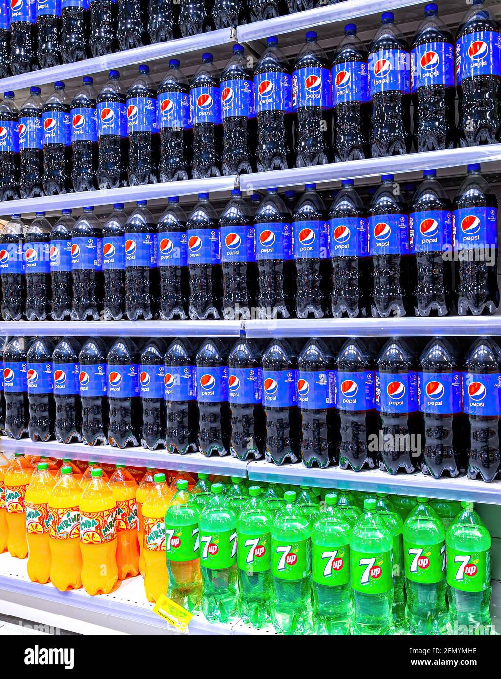Samara, Russia - May 9, 2021: Plastic bottles of Pepsi Cola ahd other beverages on store shelf Stock Photo