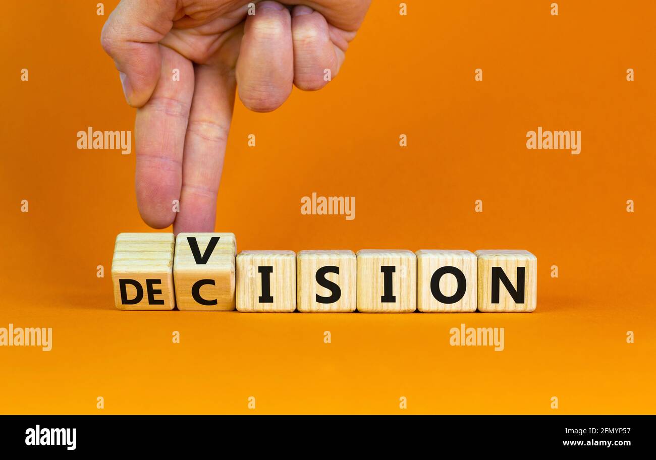 Decide Vision Vision and decision symbol. Businessman turns wooden cubes and changes ...