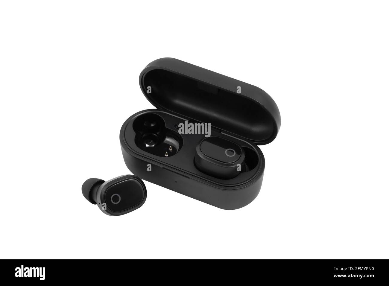 Modern wireless earbuds headphones lying in a charging case isolated on white background. Stock Photo