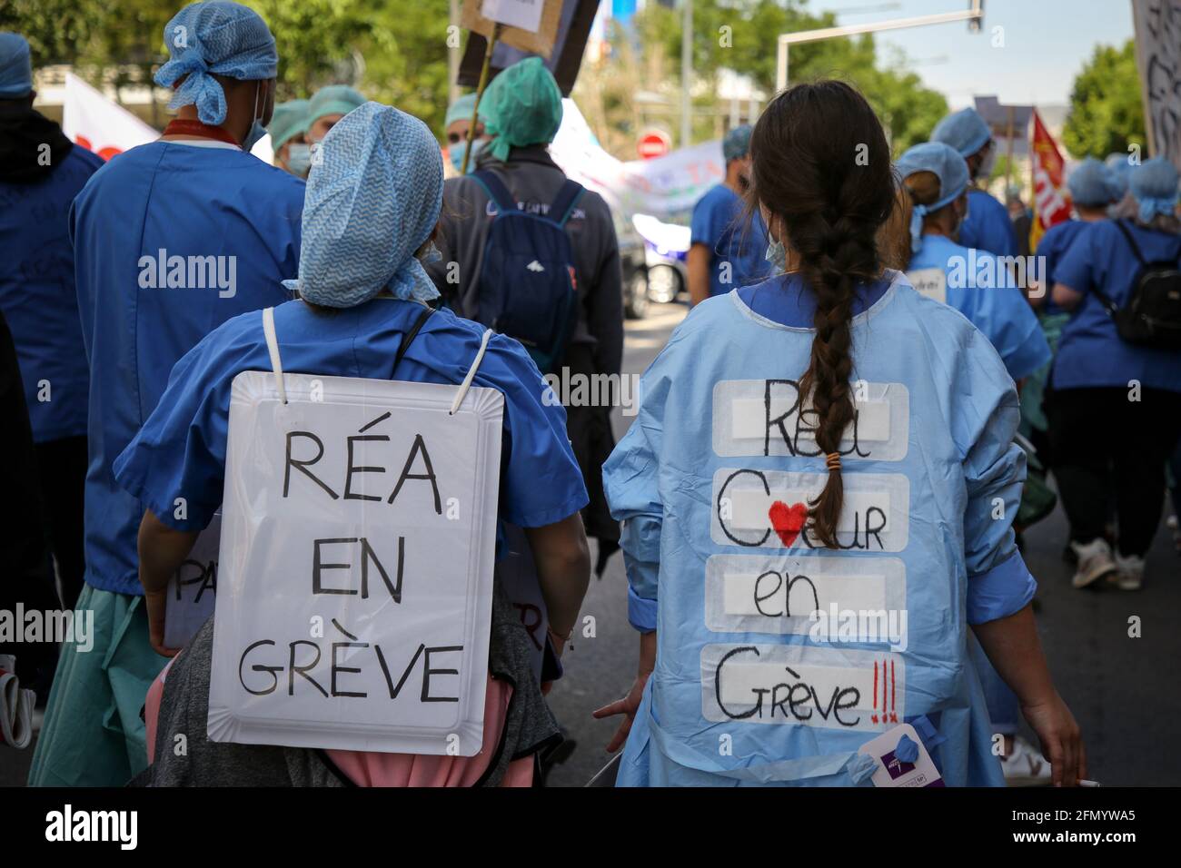 Marseille, France. 11th May, 2021. Nurses wearing placards demanding wages during the demonstration.Nurses in intensive care have demonstrated in several cities in France to demand better working conditions and an increase in their salaries, the Covid pandemic having increased their workload. Credit: SOPA Images Limited/Alamy Live News Stock Photo