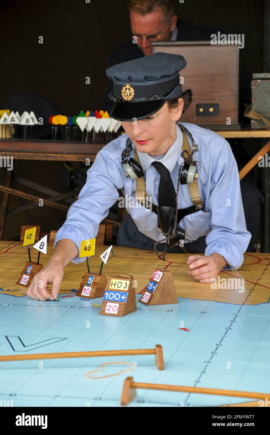 Second World War Royal Air Force, RAF, Women's Auxiliary Air Force, WAAF female plotter in a re-creation of a Sector Control Room. Fighter operations Stock Photo