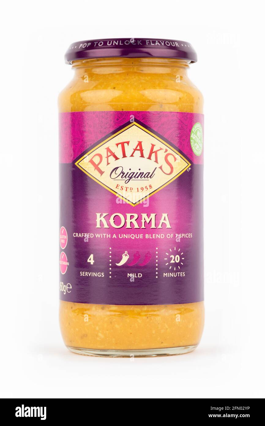A jar of Patak's original korma sauce shot on a white background. Stock Photo