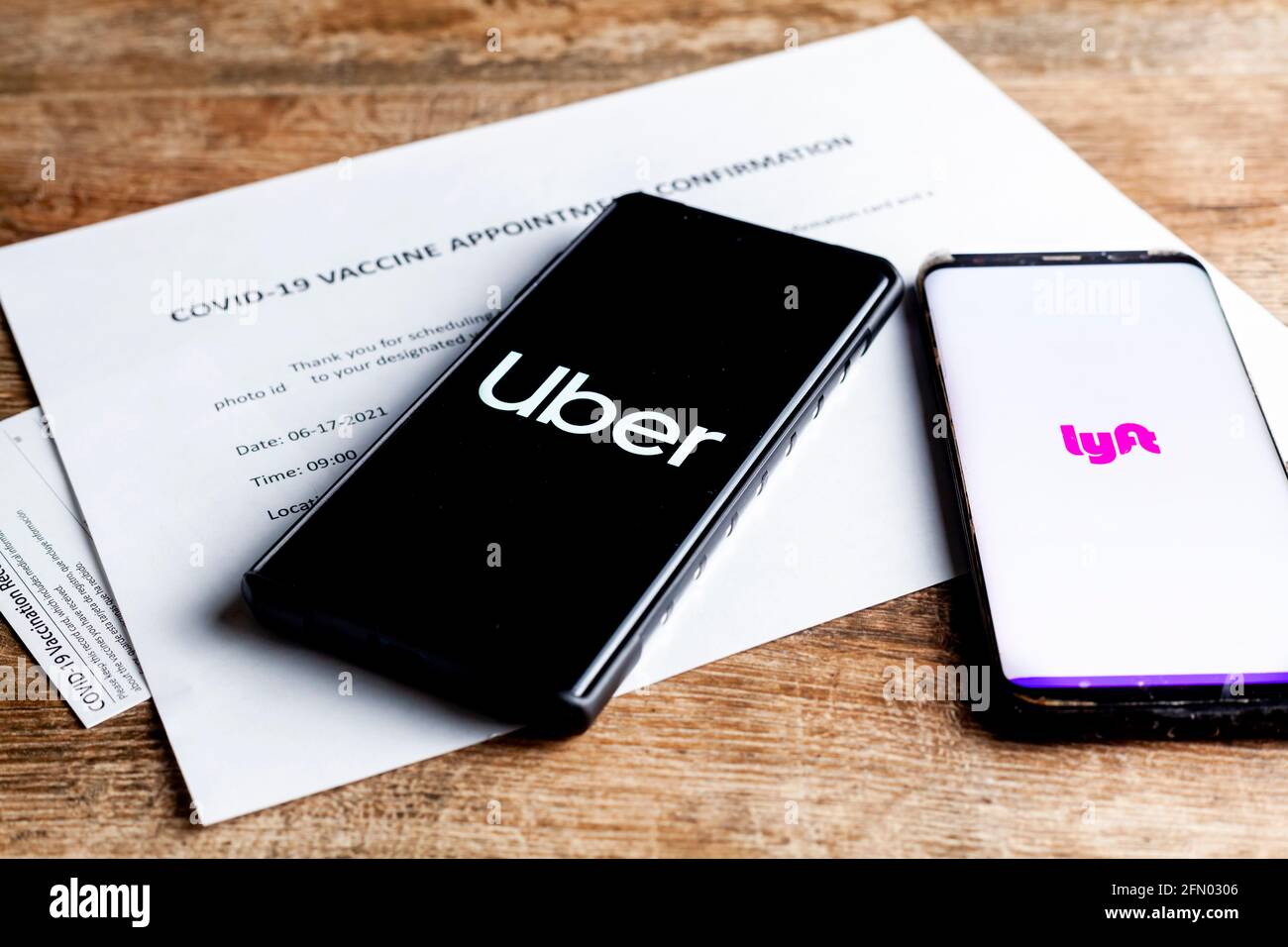 Clarksburg, MD, USA 05-12-2021: Biden administration announced an agreement that ride share apps  lyft and uber will offer free transportation to vacc Stock Photo