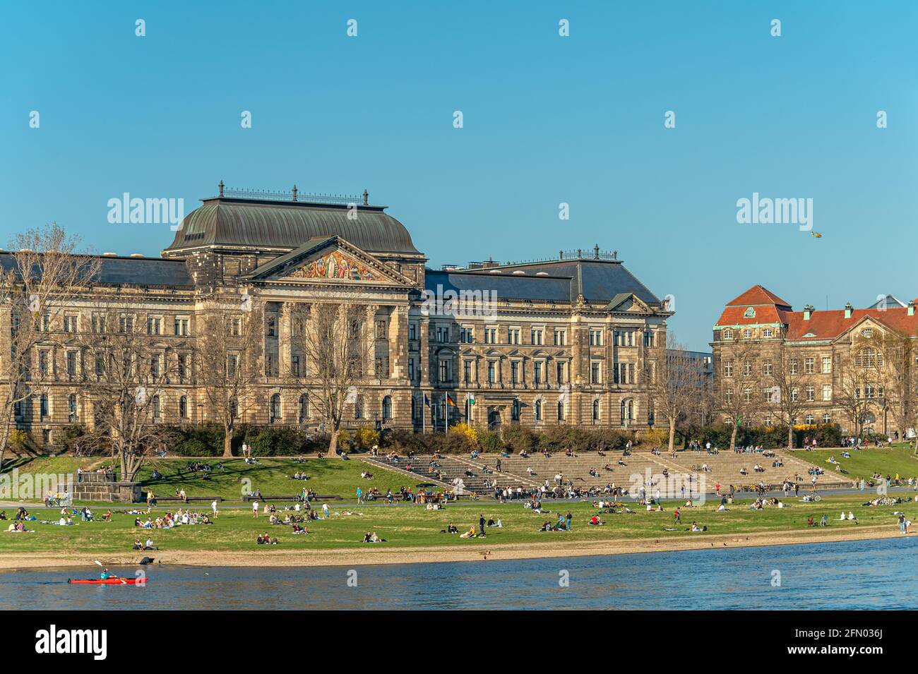 Local people in Dresden enjoying spring at the shore of the Elbe River, Saxony, Germany Stock Photo