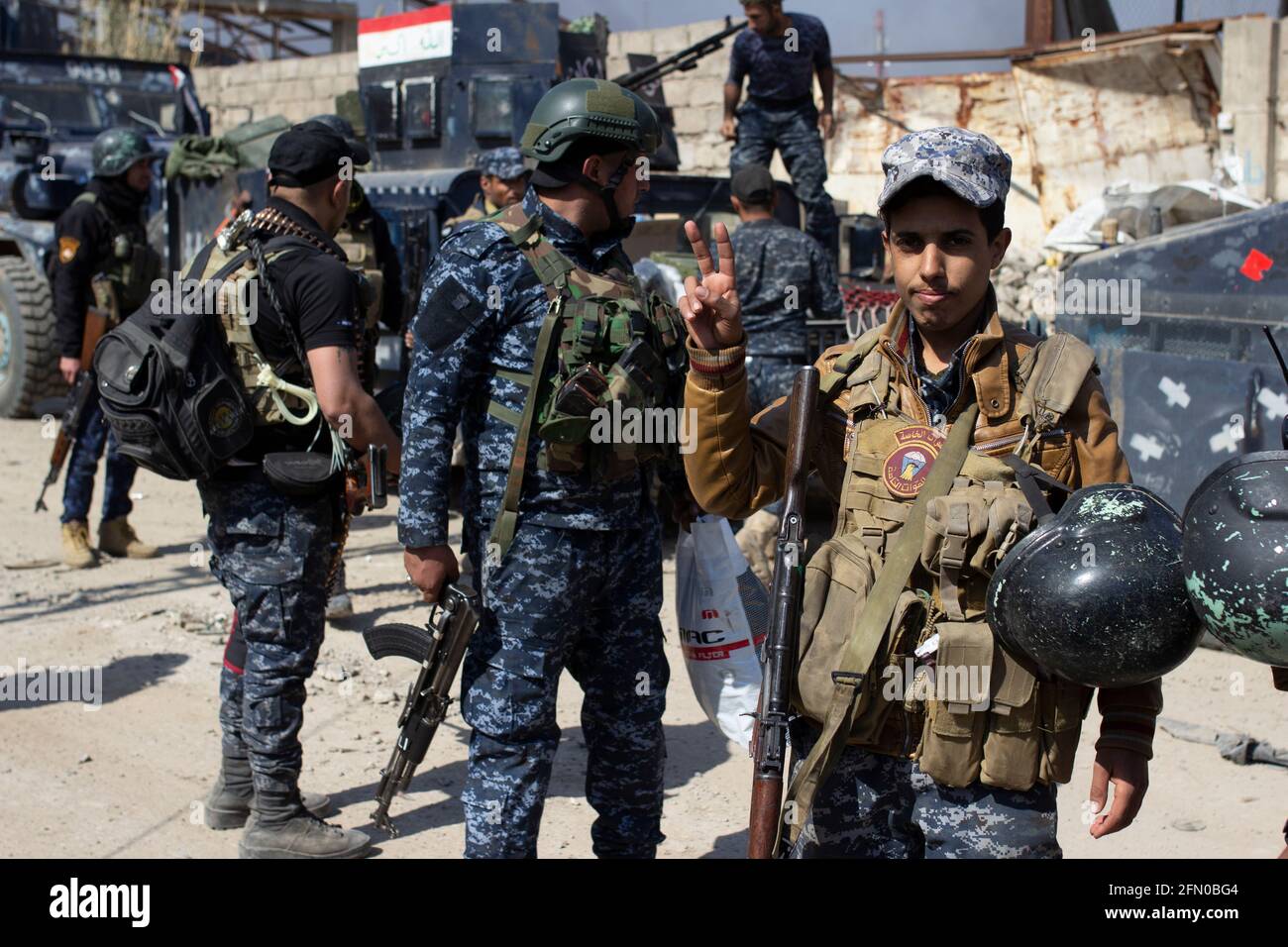 Mosul, Iraq. 7th Mar 2017 An Iraqi Federal Police soldier poses for a photograph in West Mosul, Iraq. Stock Photo