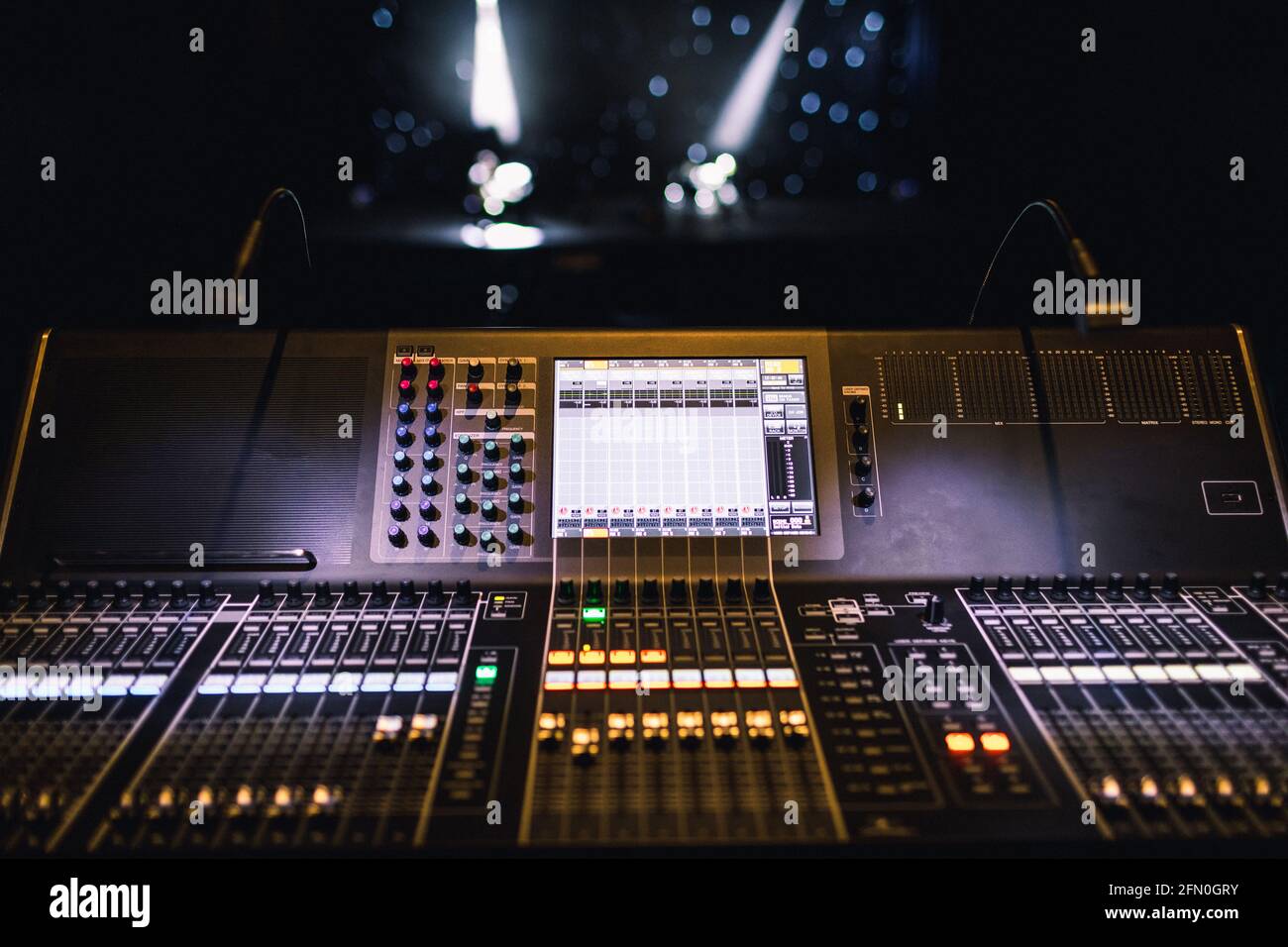 Professional sound and audio mixer control panel with buttons and