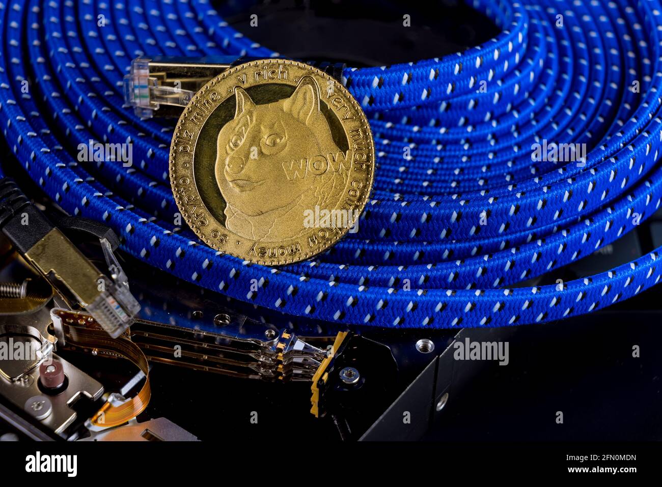 New cryptocurrency Dogecoin on a mining a virtual currency for using computer hard disk drives Stock Photo