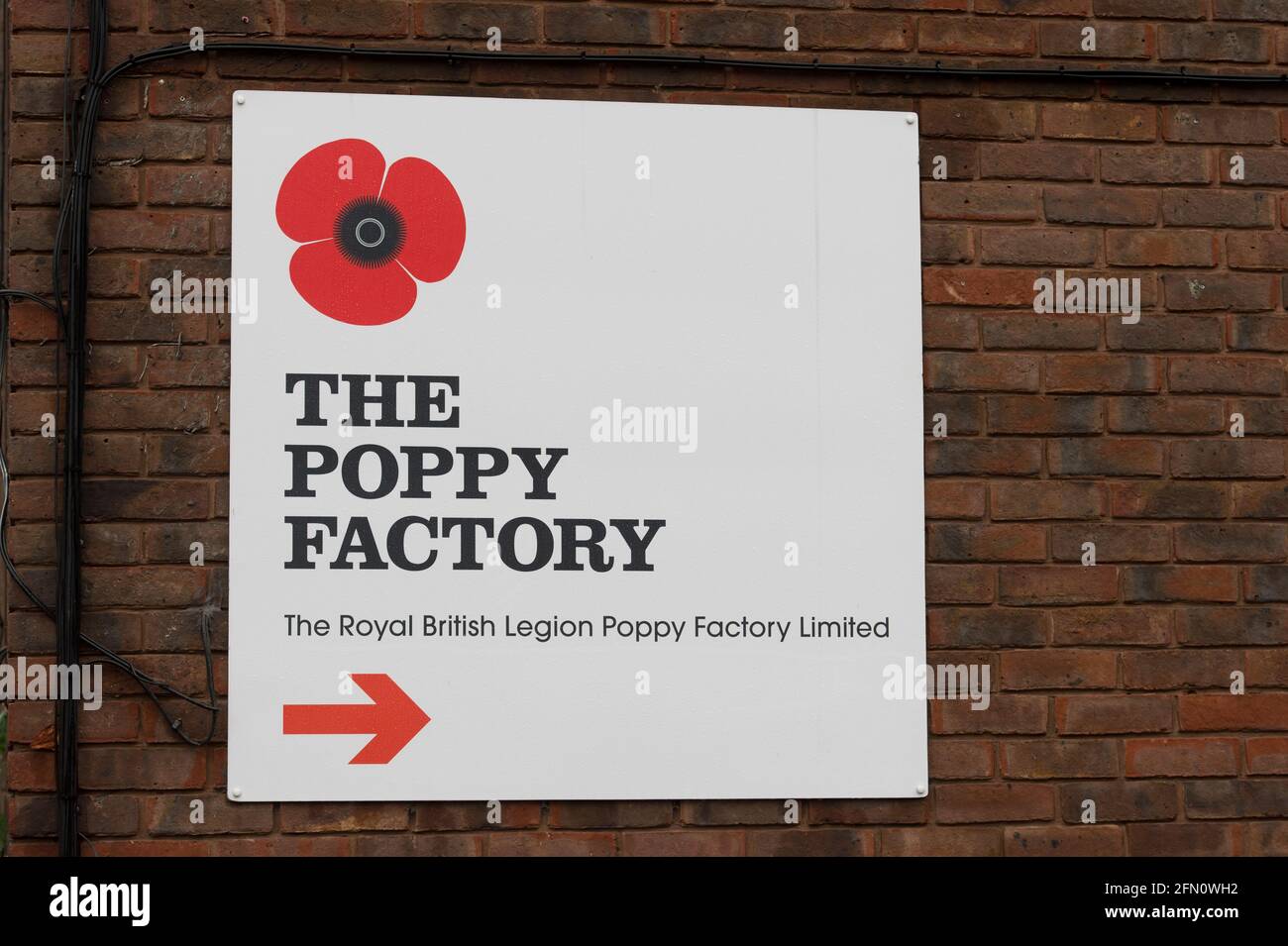 The Royal British Legion's Poppy Factory, 20 Petersham Road, Richmond, London, UK. The Poppy Factory employs ex-service personnel to makes poppies, remembrance crosses, sprays and wreaths for The Royal British Legion’s annual Appeal and Remembrance Day. The Poppy Factory is also responsible for planting and hosting The Field of Remembrance at Westminster Abbey. The Royal British Legion's Poppy Factory, 20 Petersham Road, London, UK.  16 Oct 2013 Stock Photo