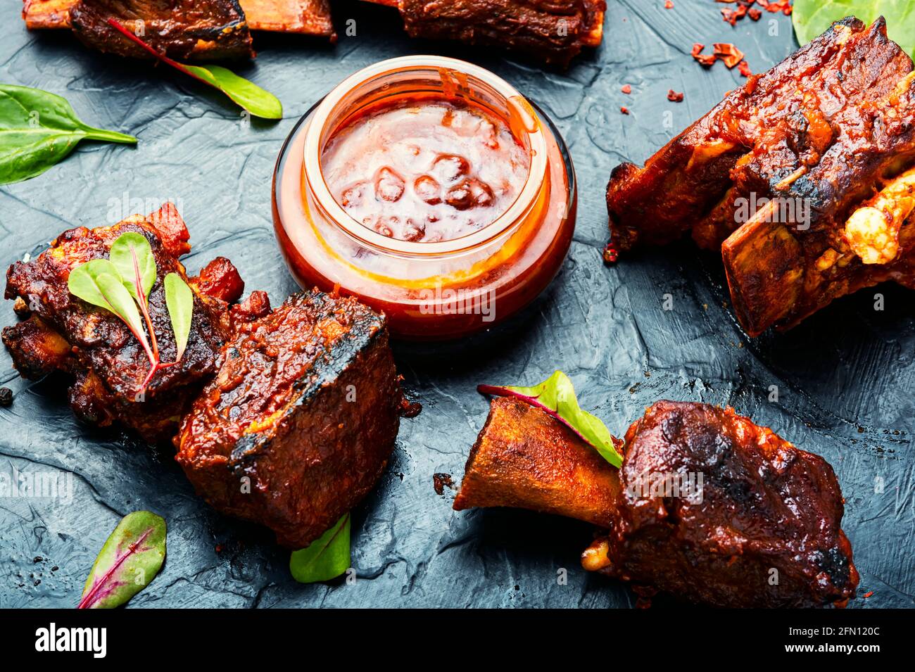 Smoked beef ribs with bone and gravy Stock Photo