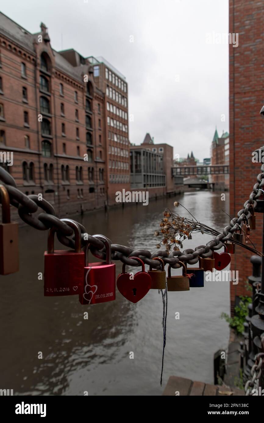 Locks on a bridge in Hamburg for lovers and strong relationships. Stock Photo