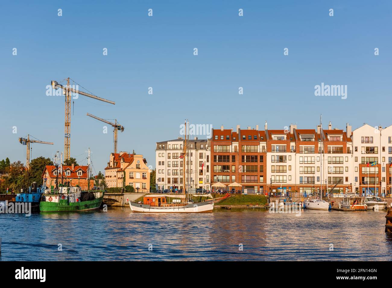 new residential and apartment buildings build in a harbour in an urban environment Stock Photo