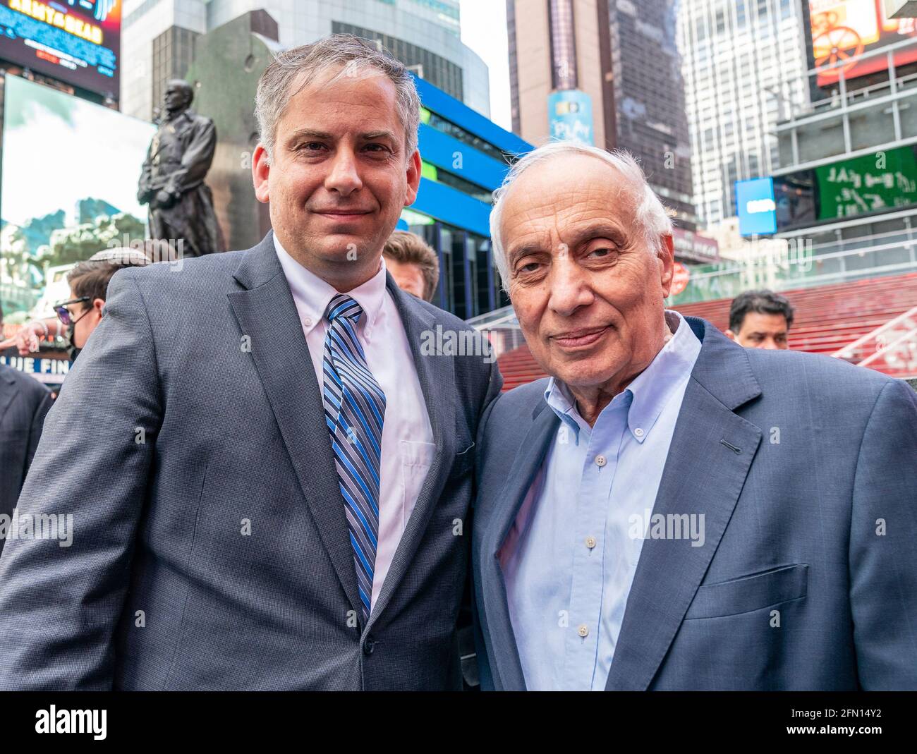 New York, United States. 12th May, 2021. Acting Consul General Israel Nitzan and Rabbi Avi Weiss attend rally in support of Israel stragles against Palestinian terrorists on Times Square in New York on May 12, 2021. More than 200 hundred supporters came for the rally. Protesters rally against HAMAS organization responsible for firing hundreds of rockets into civilian targets inside Israel. (Photo by Lev Radin/Sipa USA) Credit: Sipa USA/Alamy Live News Stock Photo