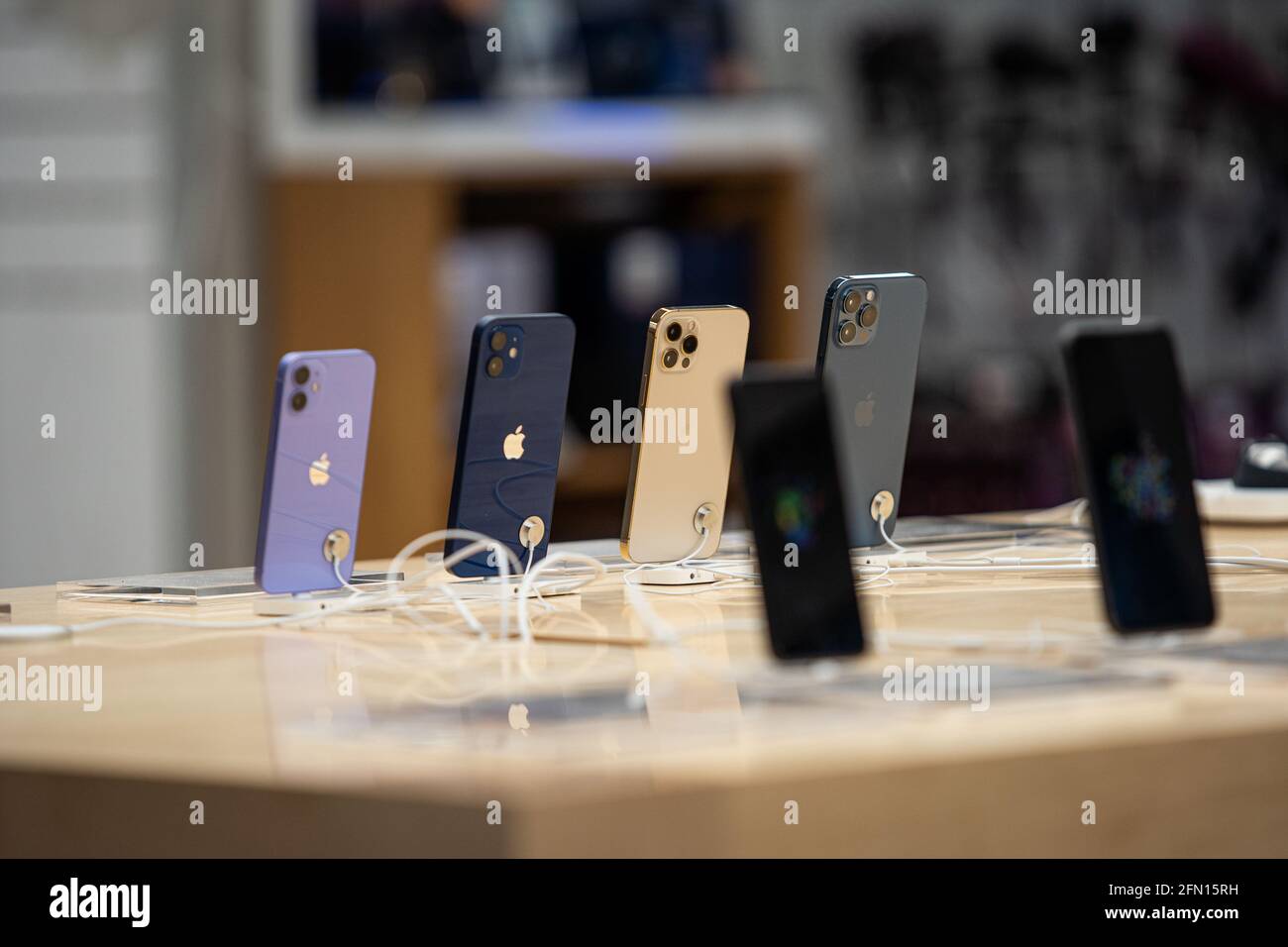 Apple authorized shop. The modern shop with apple products: Iphone, Macbook, Ipad, Apple logo. Stock Photo