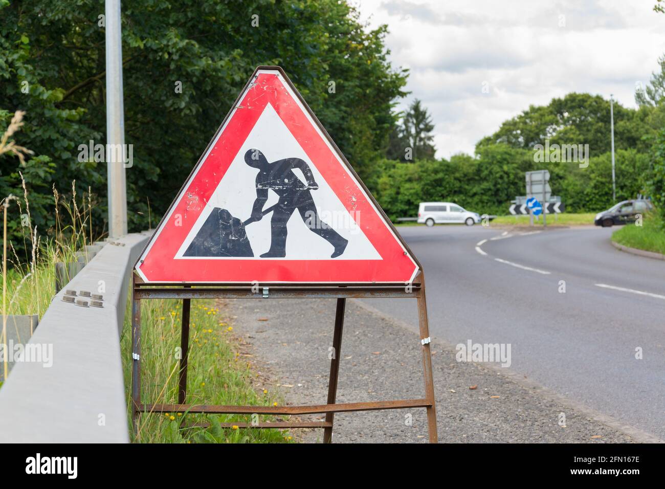 Temporary road works traffic warning sign during highway repairs on the B5070 and A5 outside Chirk Wales Stock Photo