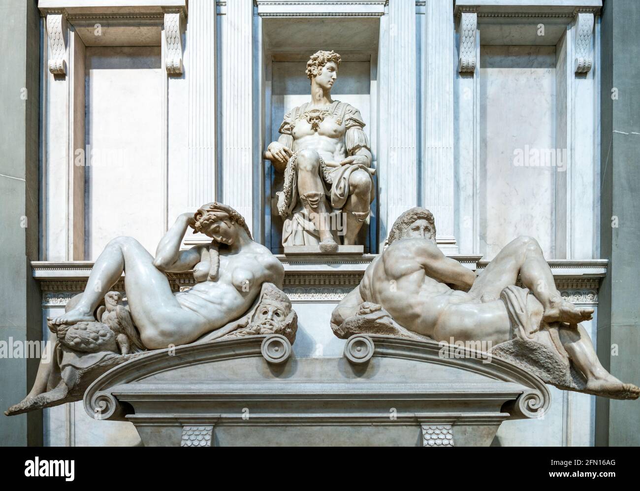 Florence, Italy, Medici chapels, the tomb of Giuliano Duke of Nemours, by Michelangelo, with tthe statues representig (from left) the Day, the Duke an Stock Photo