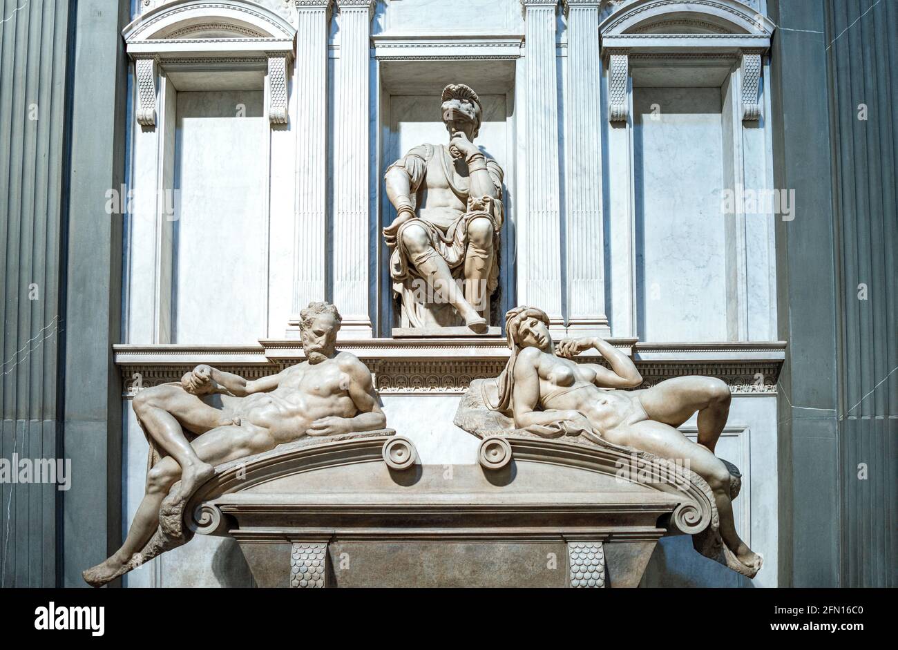 Florence, Italy, Medici chapels, the tomb of Giuliano Duke of Urbino, by Michelangelo, with tthe statues representig (from left) the Dawn, the Duke an Stock Photo