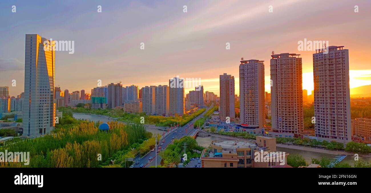 KORLA, CHINA - MAY 12, 2021 - Urban buildings are seen at sunset in Korla,  Xinjiang, China, May 12, 2021. (Photo by QUEHURE / Costfoto/Sipa USA Stock  Photo - Alamy