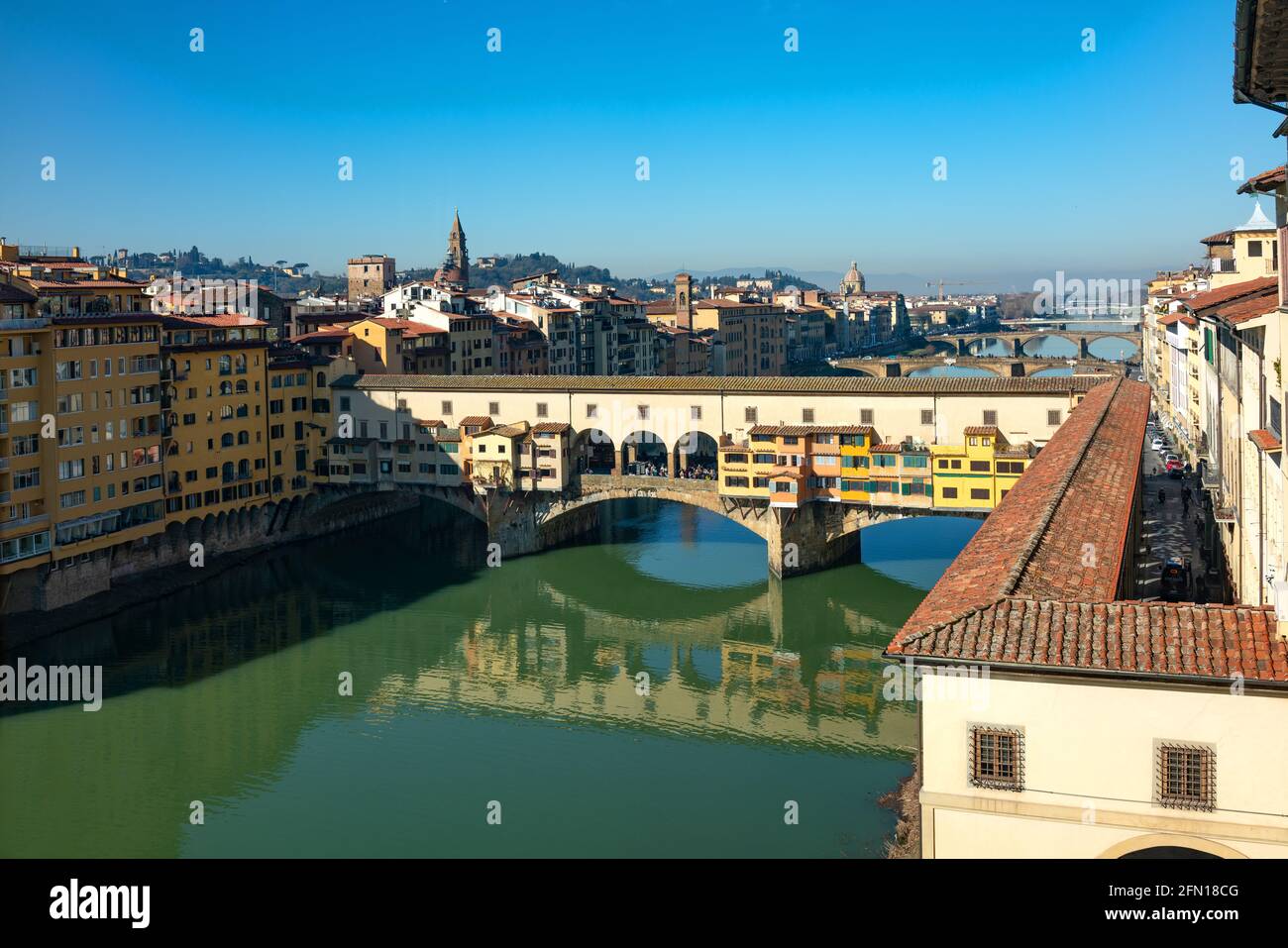 Florence, Italy, Panoramic view of the city vith the Ponte Vecchio(old bridge) in the foreground, seen from the Uffizi Gallery Stock Photo