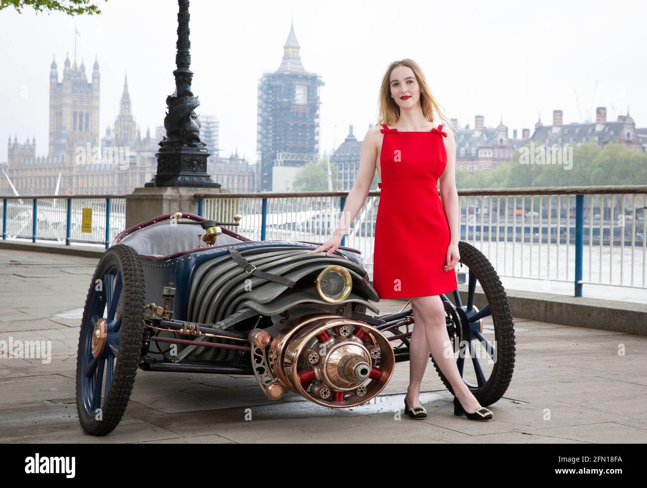 EDITORIAL USE ONLY Actor Ann Skelly, who stars in new Sky Atlantic show The Nevers, unveil a Victorian-style car, which is created and driven by her character Penance Adair in the show, at the launch of the drama on London???s Southbank. Picture date: Thursday May 13, 2021. Stock Photo