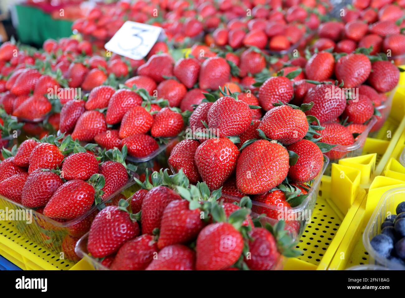 Fresh strawberries at a farmer market. Selecctive focus Stock Photo