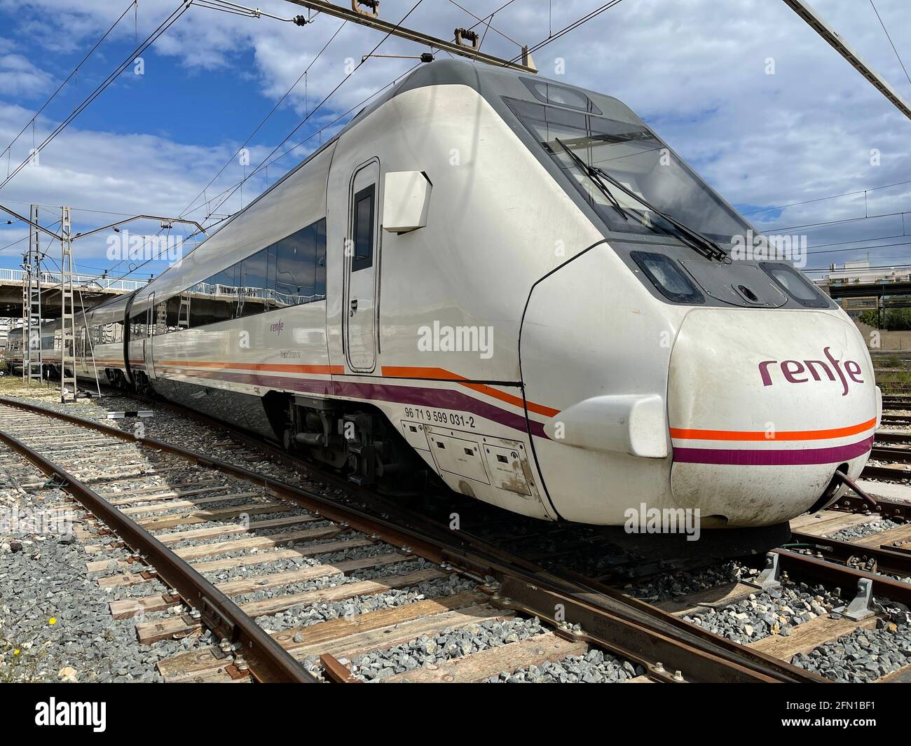 Spanish regional train running on the track Stock Photo Alamy