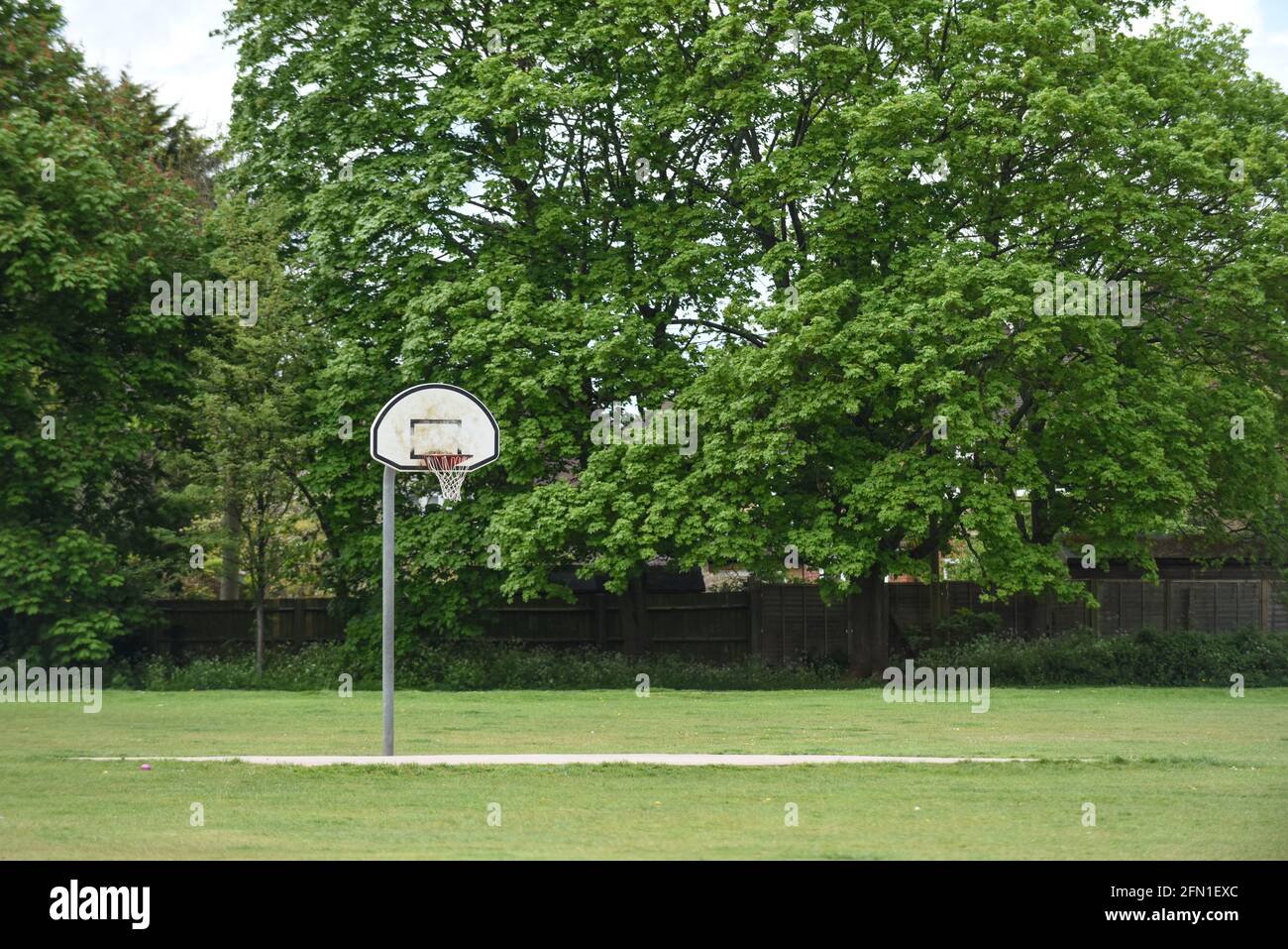 Basketball hoop with net on an outdoor basketball court Stock Photo Alamy