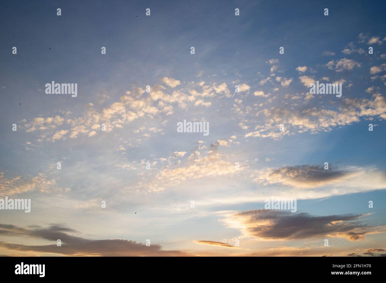 sunset sky background pink clouds Stock Photo - Alamy