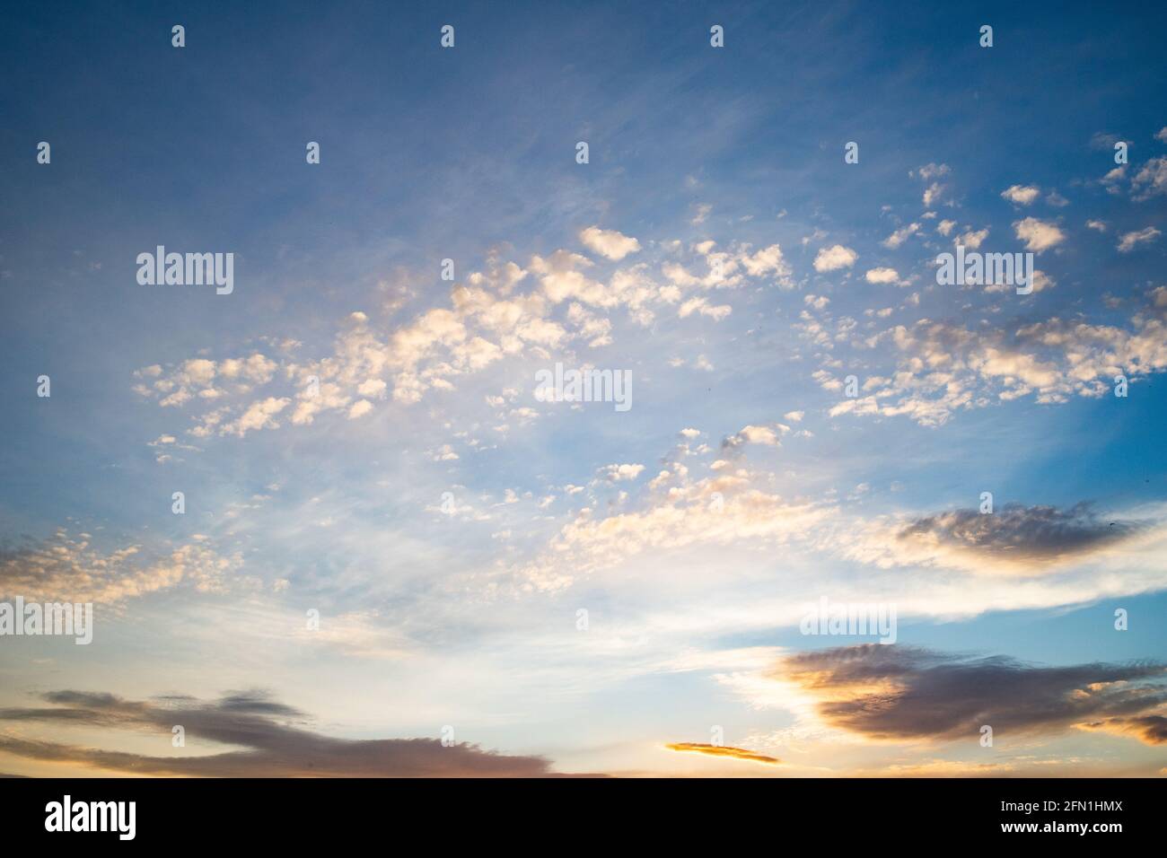 sunset sky background pink clouds Stock Photo - Alamy